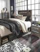 Signature Design by Ashley® Drystan Brown Queen 4-Drawer Storage Panel Bed-4