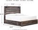 Signature Design by Ashley® Drystan Brown King 4-Drawer Storage Panel Bed-3