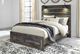 Signature Design by Ashley® Drystan Brown Queen Storage Panel Bed-4